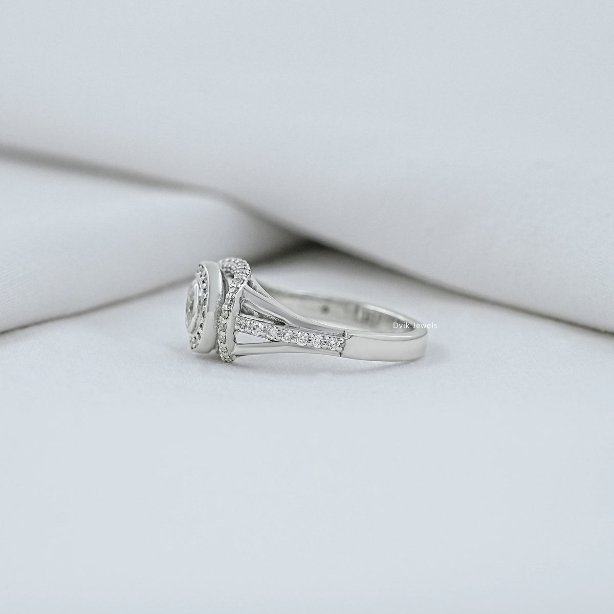Oval Diamond Halo Split Shank Engagement Ring