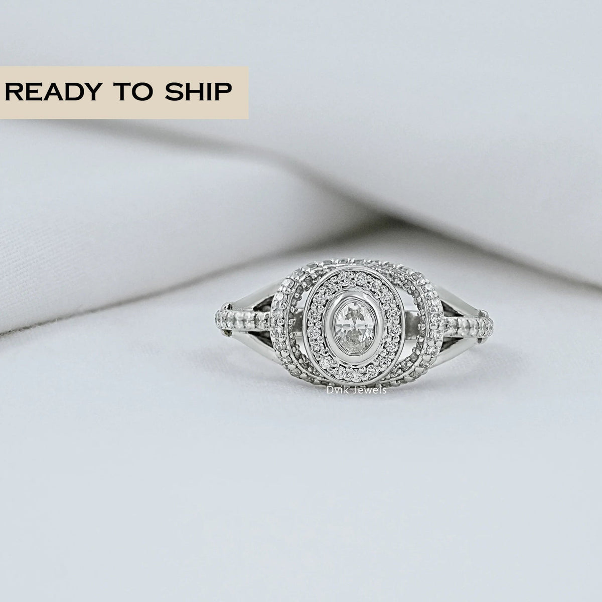 Oval Diamond Halo Split Shank Engagement Ring