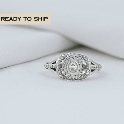 Oval Diamond Halo Split Shank Engagement Ring