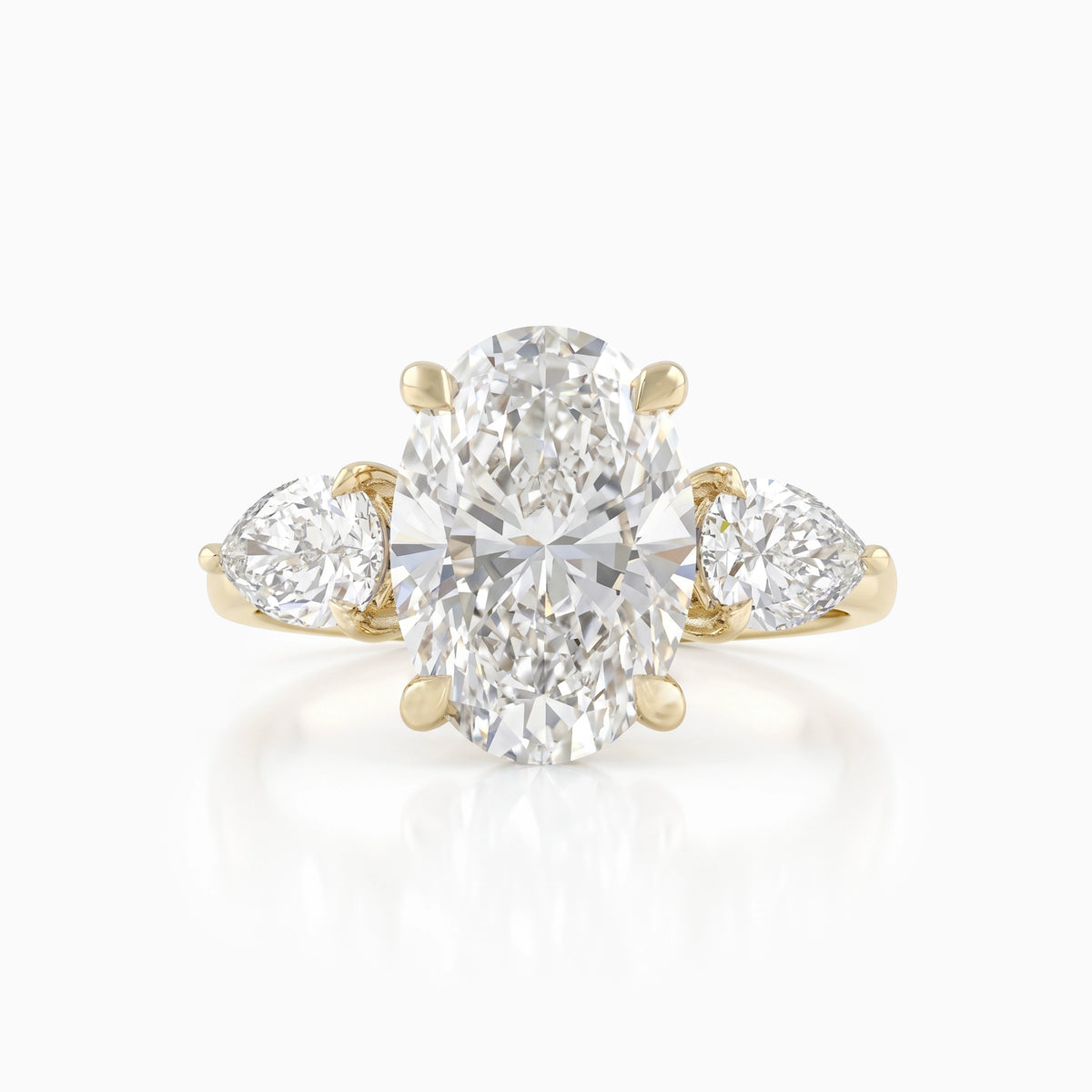 Oval and Pear Cut Lab Diamond Three Stone Ring Ring