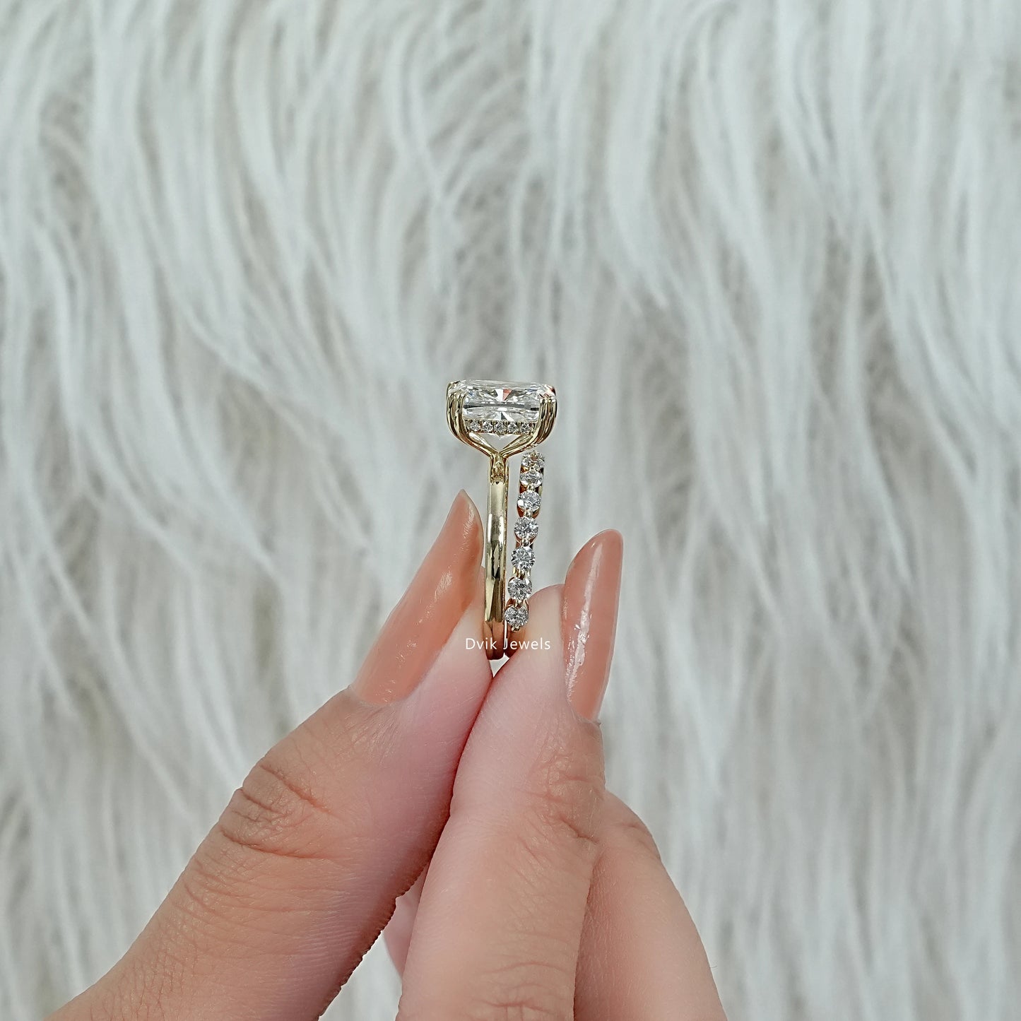 Dvik Jewels 14k gold ring showcasing the side profile of a bridal stack.