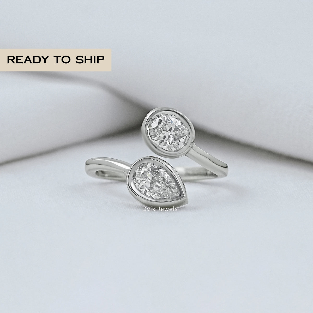 Pear And Oval Diamond Bezel Bypass Ring