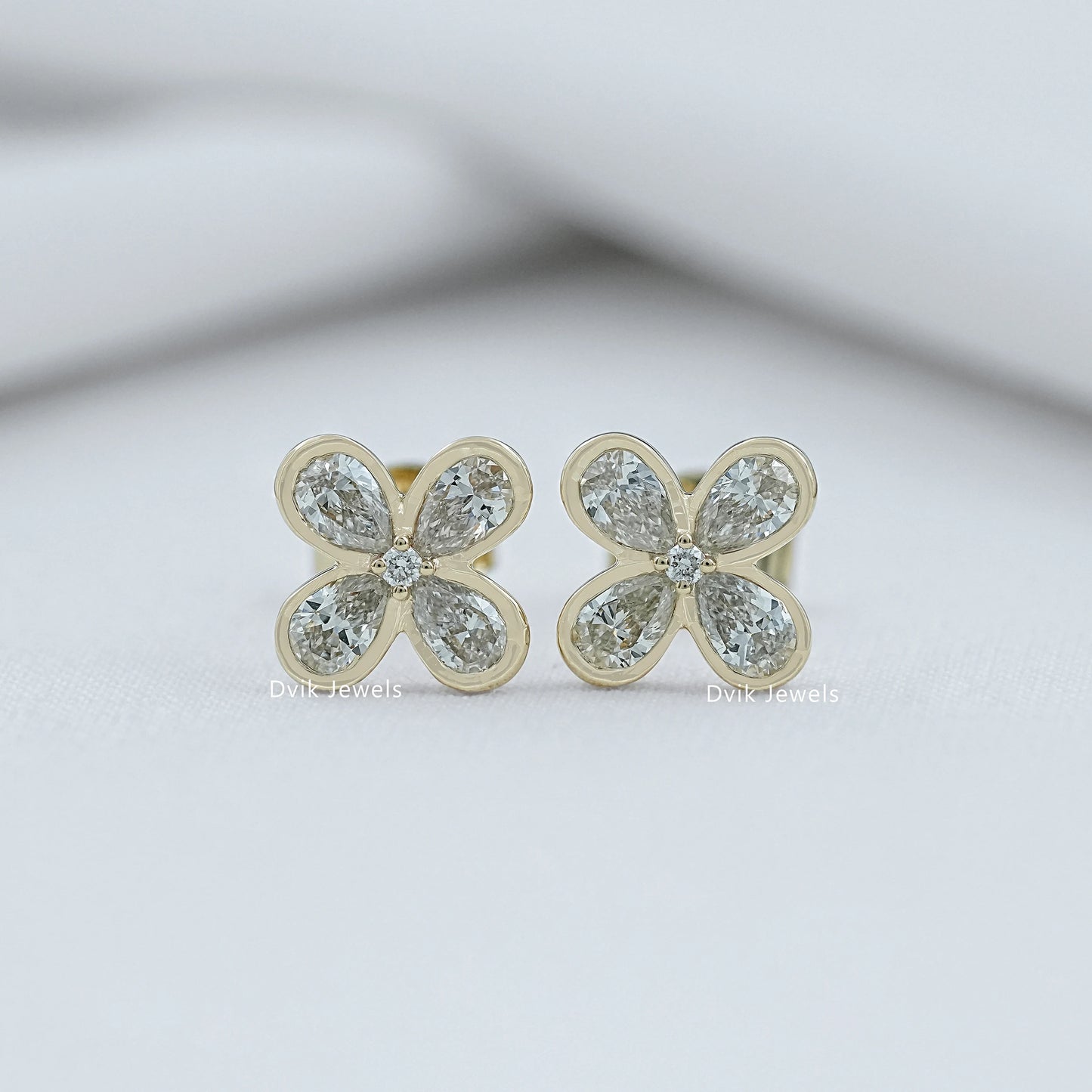 Bezel Set Pear Diamond Floral Stud Earrings