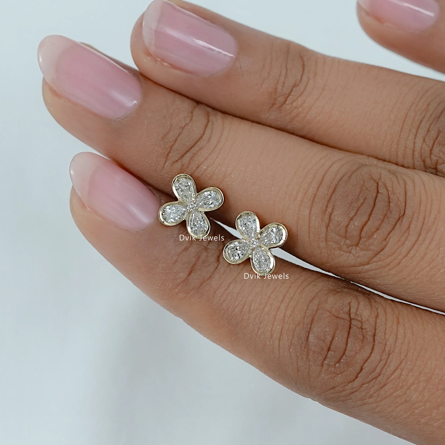 Bezel Set Pear Diamond Floral Stud Earrings
