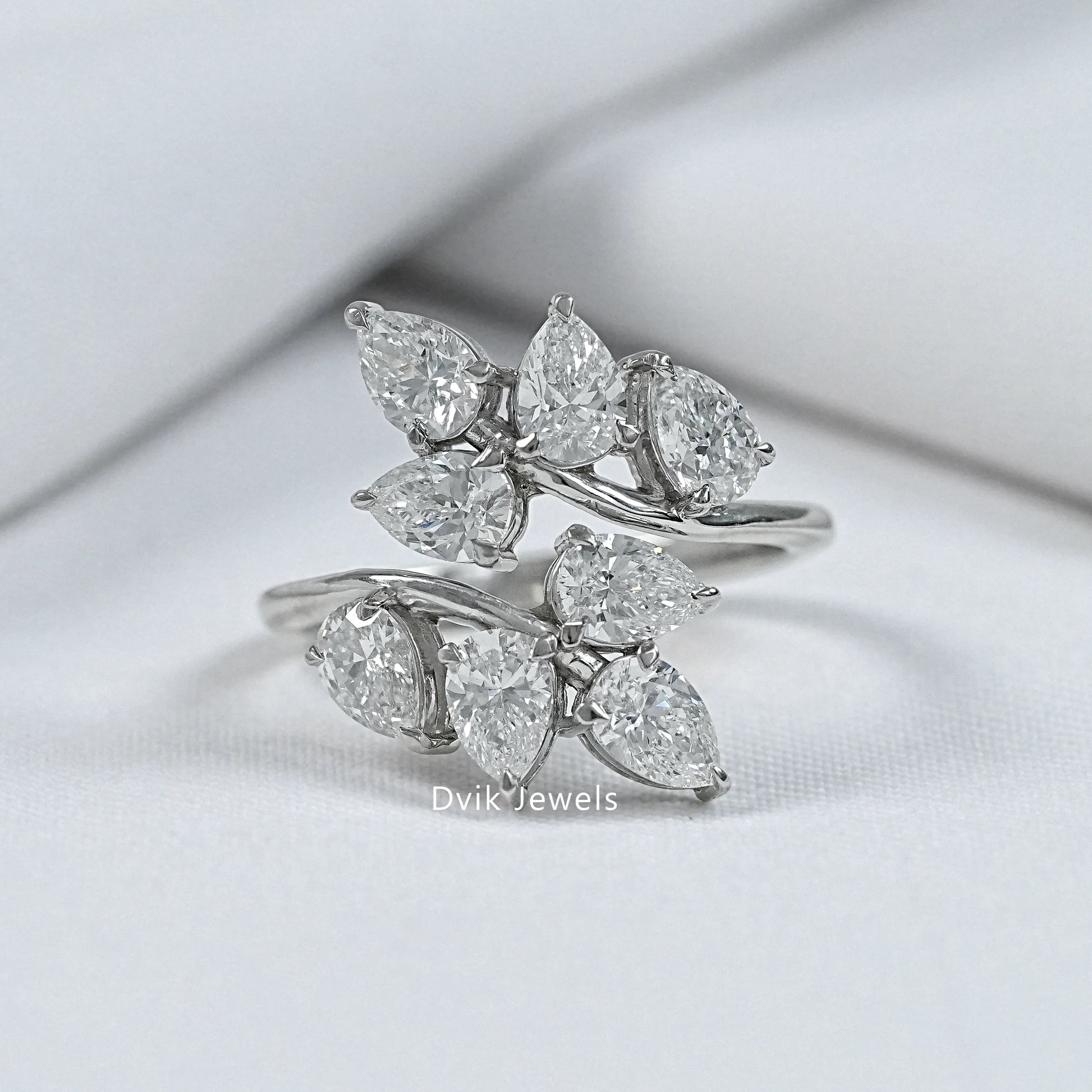 Dvik Jewels display pear cut lab diamond cluster bypass ring in white gold