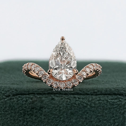 Teardrop ring with wedding band rose gold front view on green box