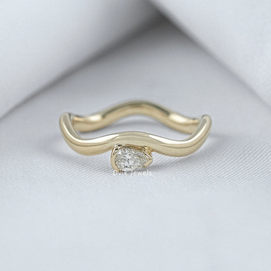 Pear cut lab diamond curved wavy engagement ring by Dvik Jewels