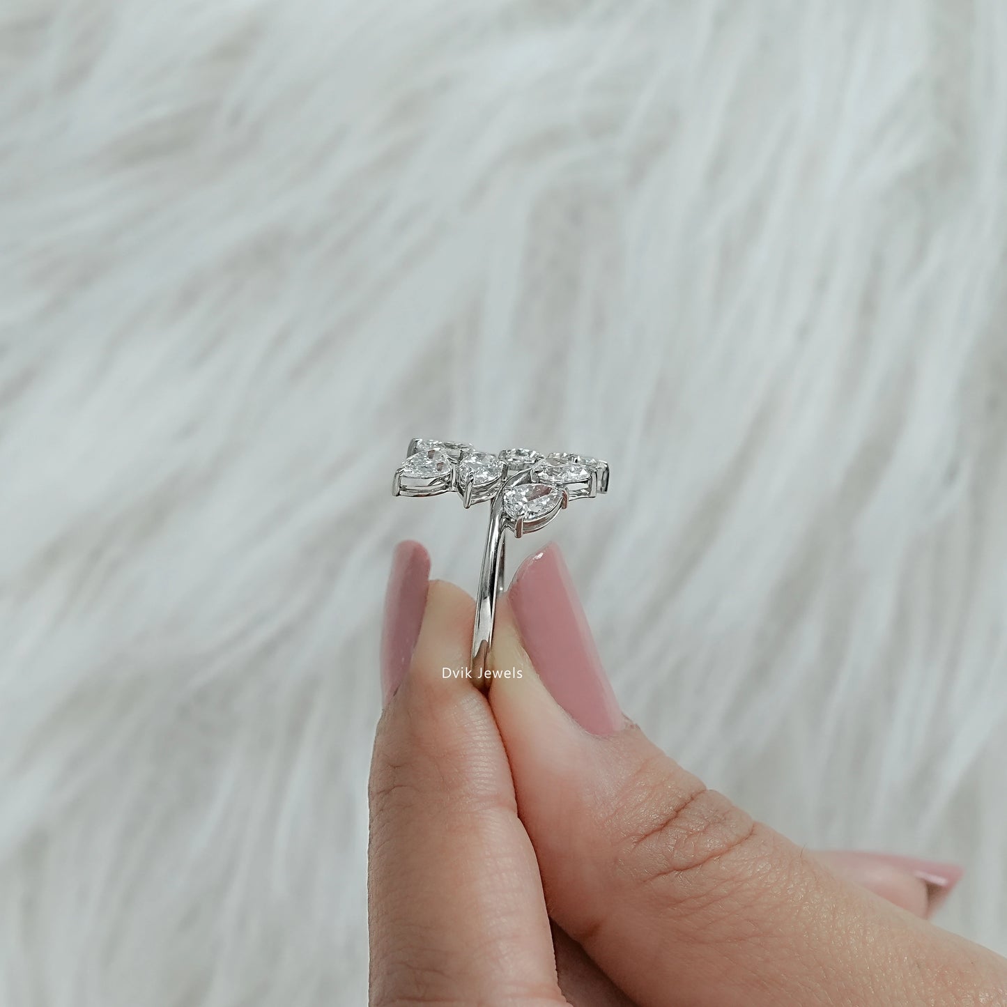 Side view of lab grown diamond cluster ring showing thickness of silver band