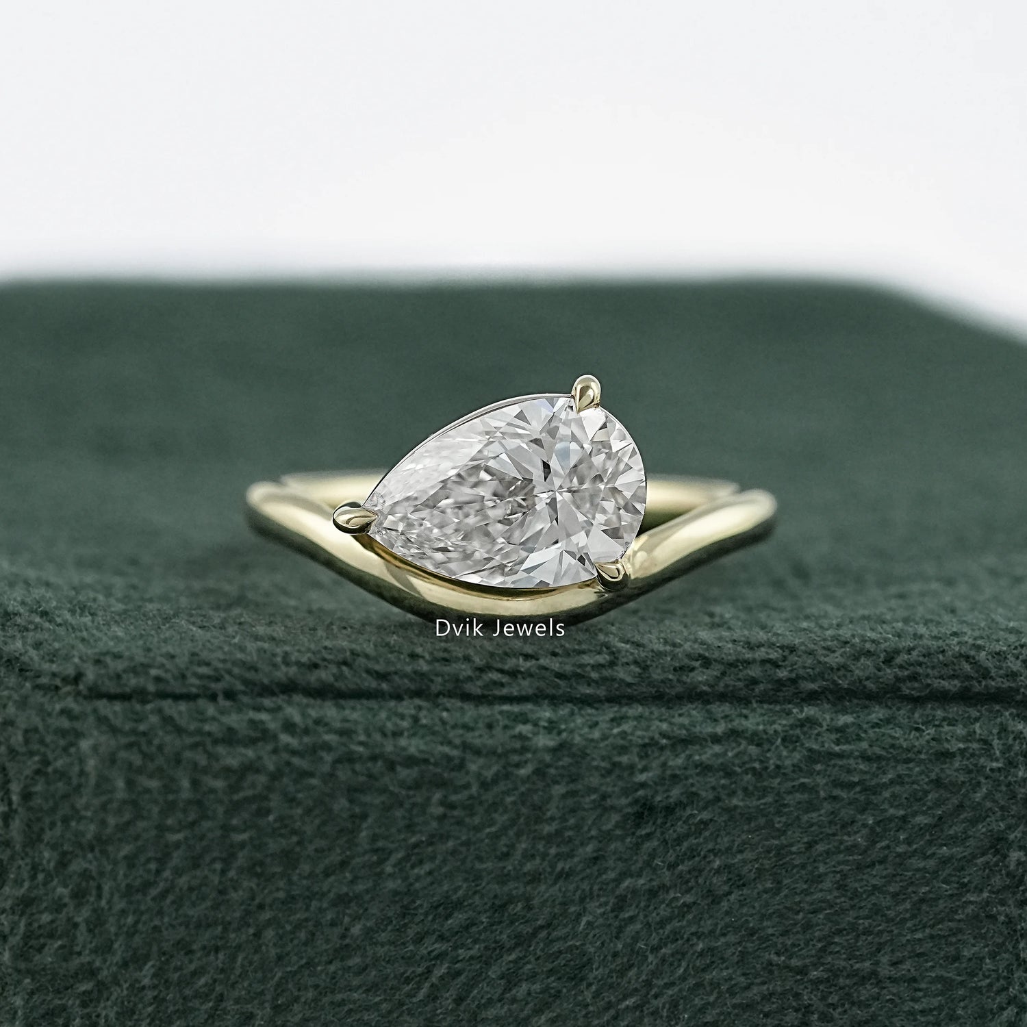 Dvik jewels lab grown pear diamond ring crafted with smooth curved band