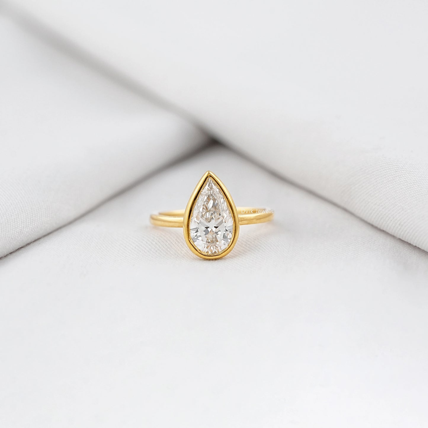 Pear Diamond Bezel Set Solitaire Engagement Ring