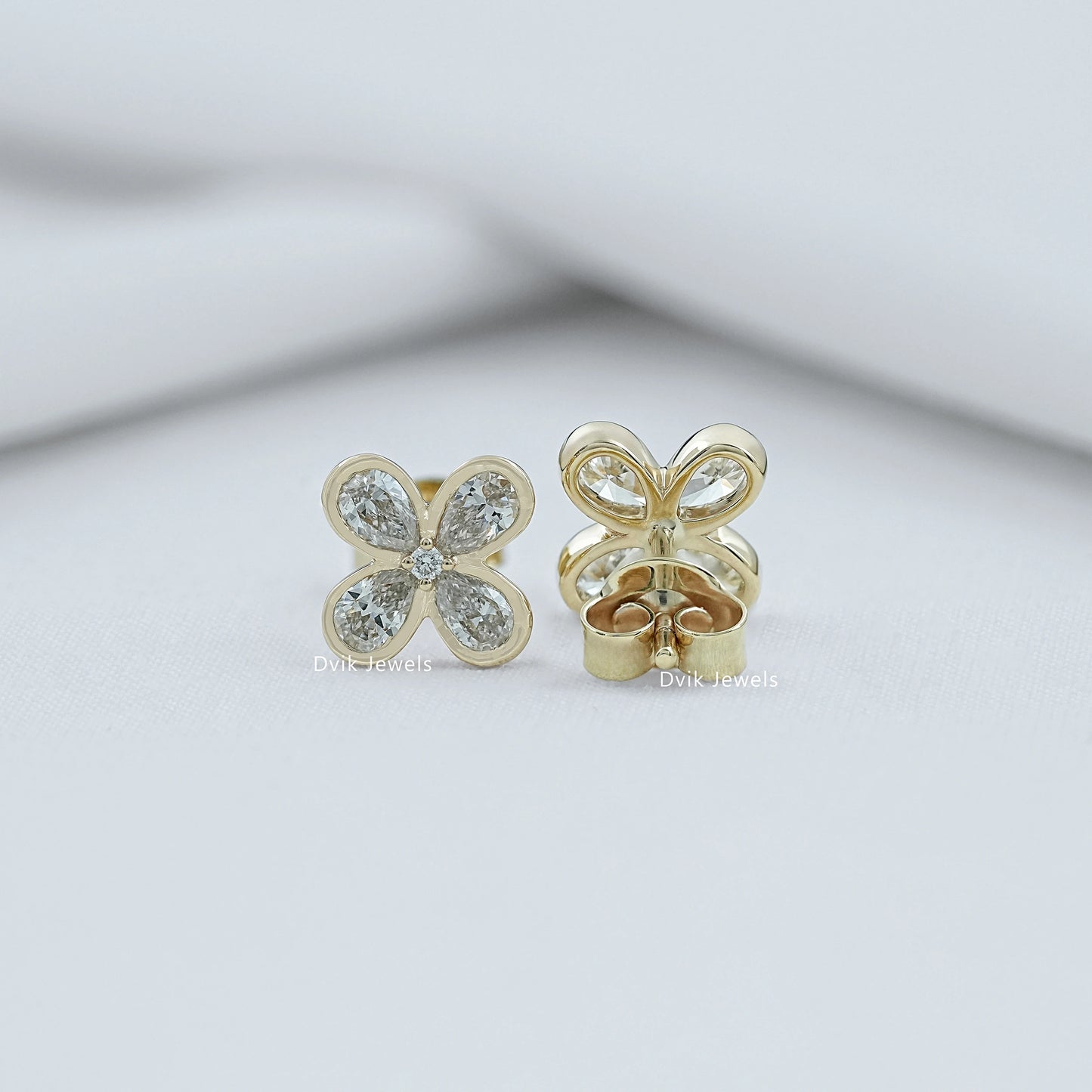 Bezel Set Pear Diamond Floral Stud Earrings