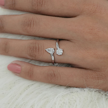 Twin stone diamond bypass engagement ring displayed on model hand