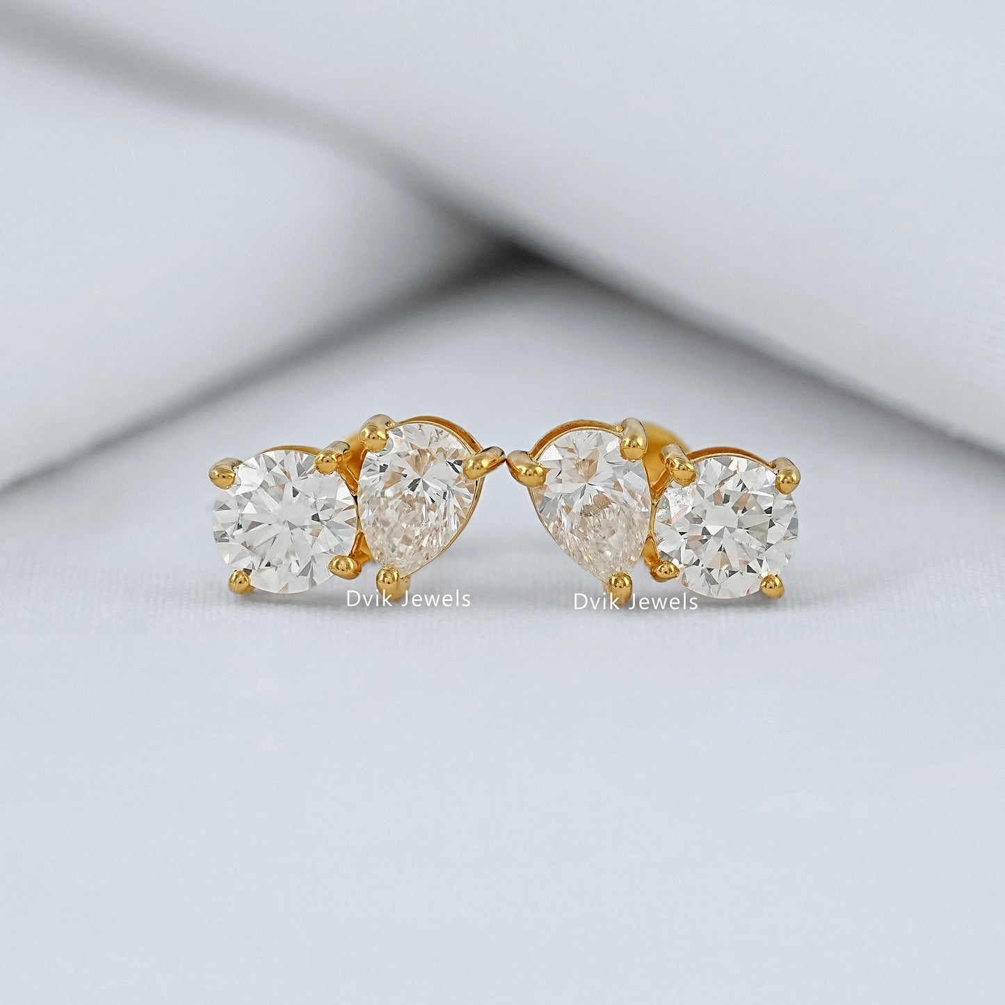 Pear and Round Lab Diamond Toi et Moi Stud Earrings Earrings