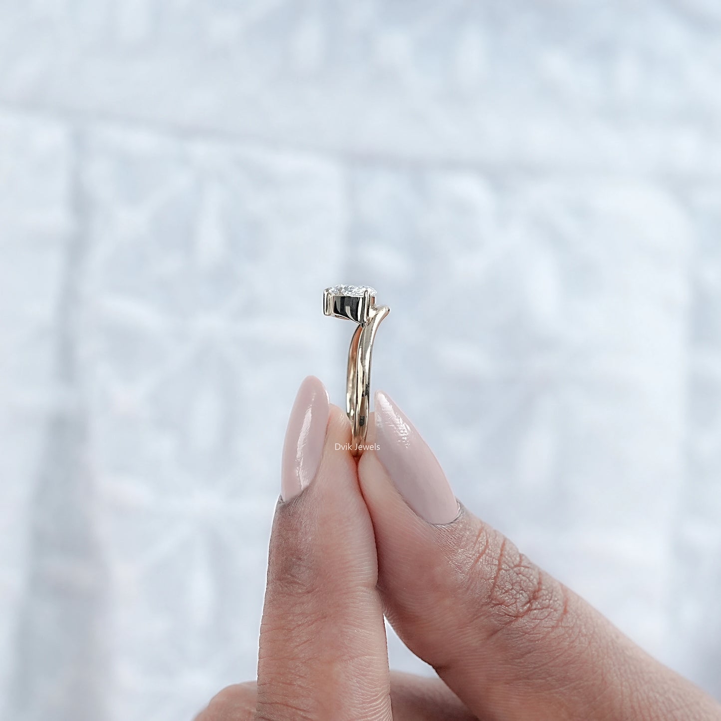 1 Carat Pear Cut Diamond Curved Ring