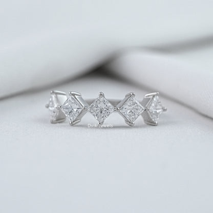 Dvik Jewels princess cut wedding rings white gold front view on soft white fabric.