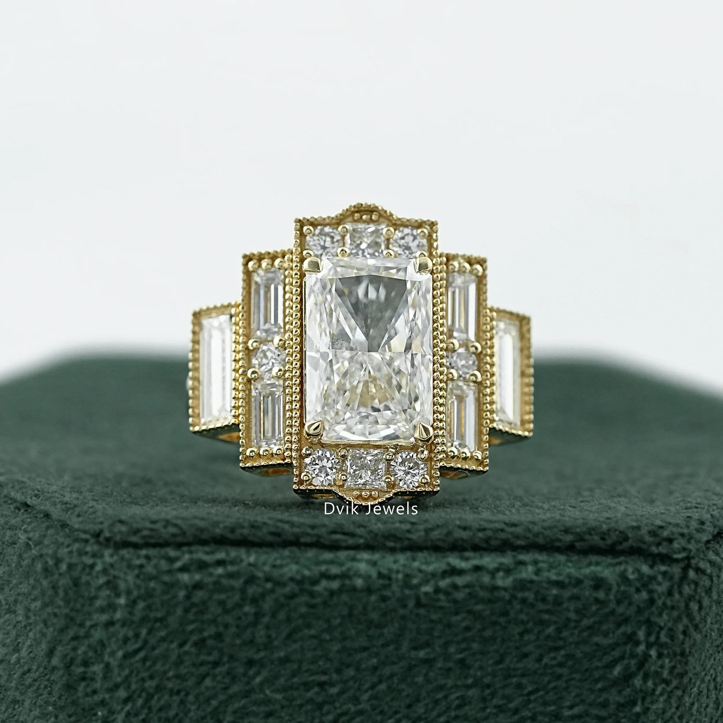 Art deco halo engagement ring in 14k gold with a vintage inspired design.