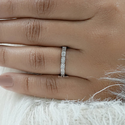2 carat wedding band showcasing a continuous line of radiant diamonds.
