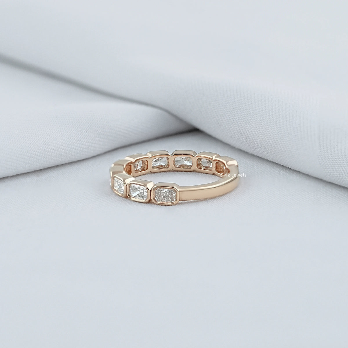 East West Radiant Cut Bezel Wedding Band