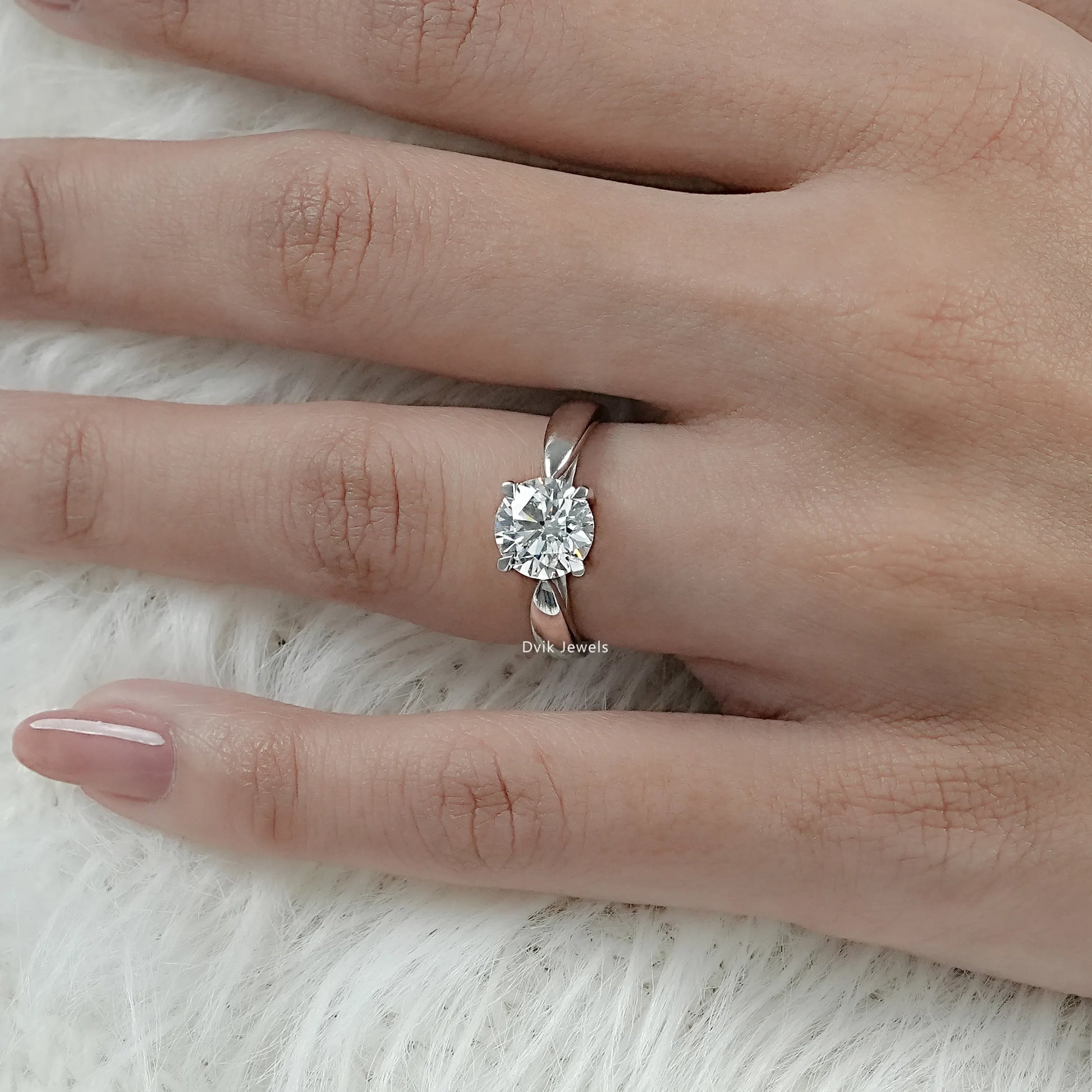 Round Brilliant Cut Solitaire Ring with IGI cerified Lab Grown Diamond displayed on model hand