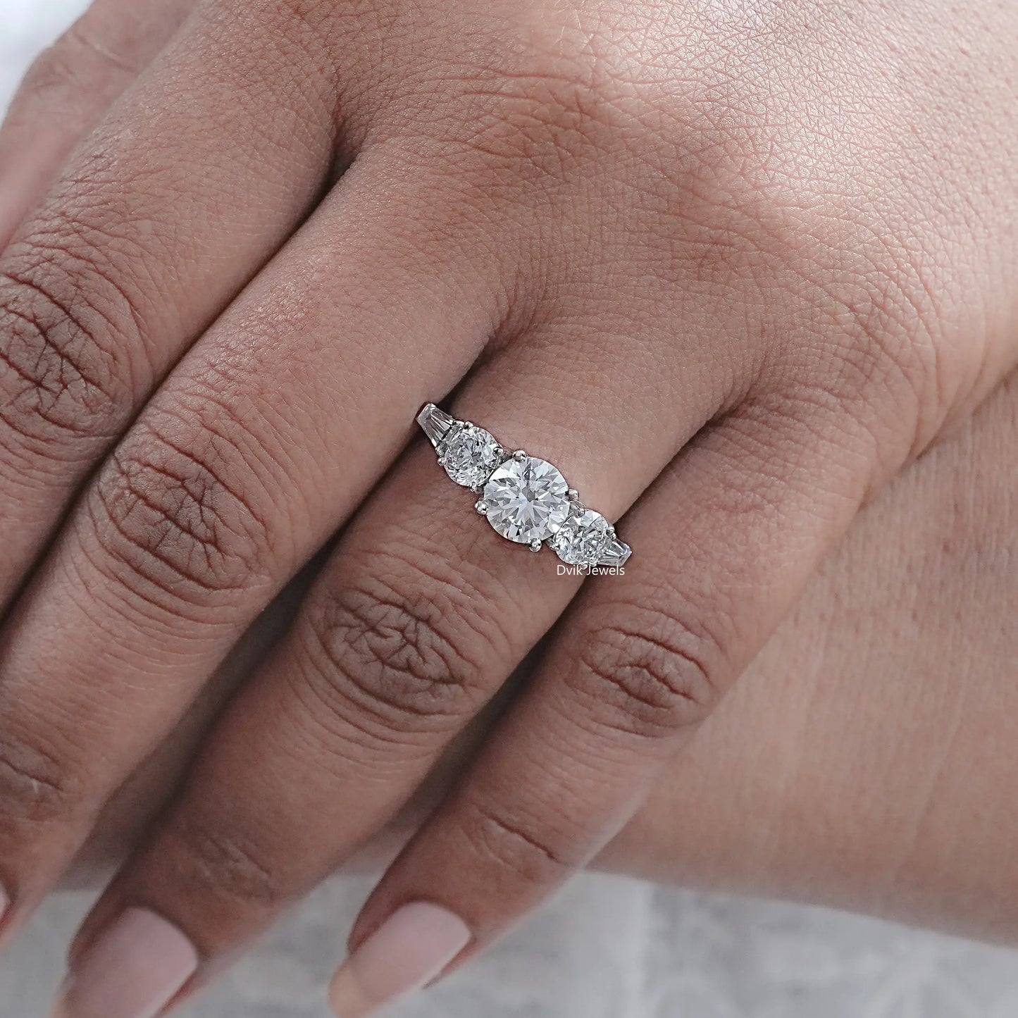 Five Stone Round And Tapered Baguette Diamond Ring