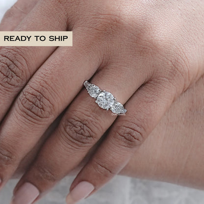 Five Stone Round And Tapered Baguette Diamond Ring