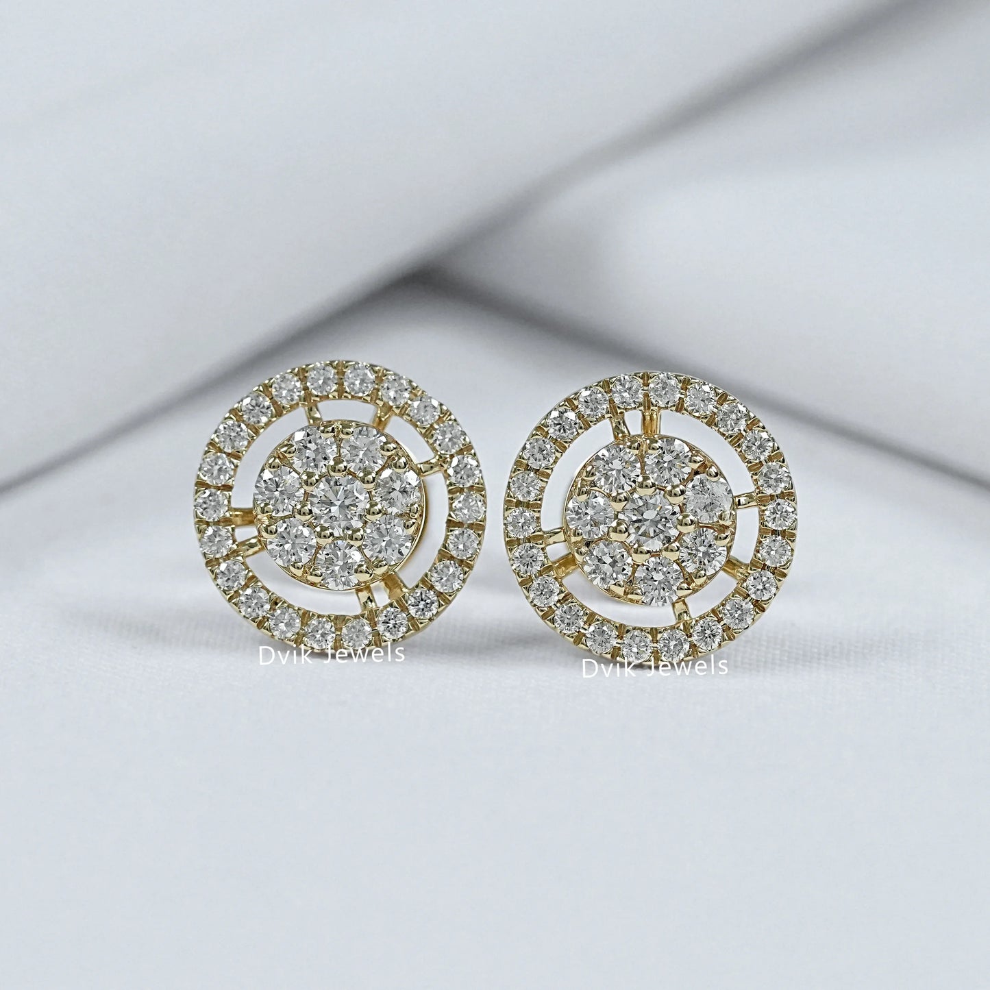 1 carat diamond stud earrings crafted with round cut halo setting