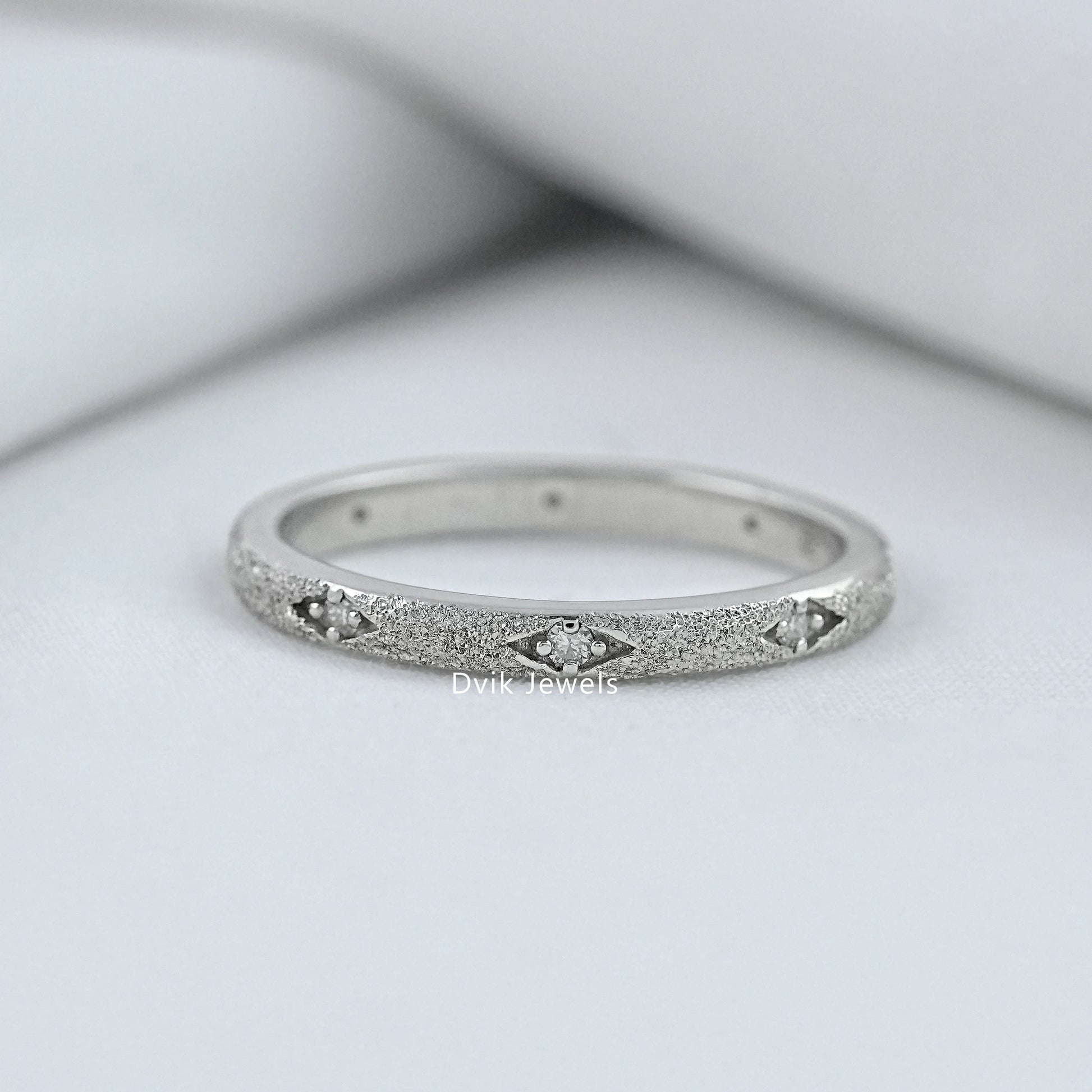 Round diamond textured wedding-band silver sandblast finish view