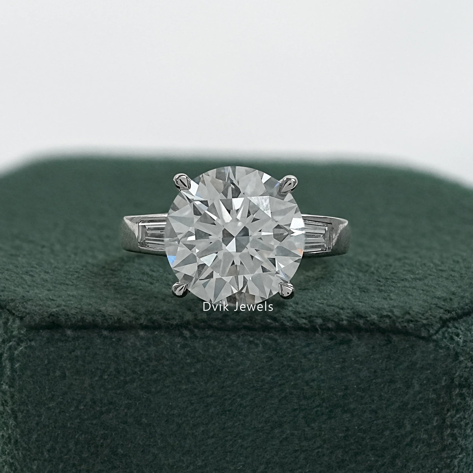 Round and baguette engagement ring round three stone engagement ring front view