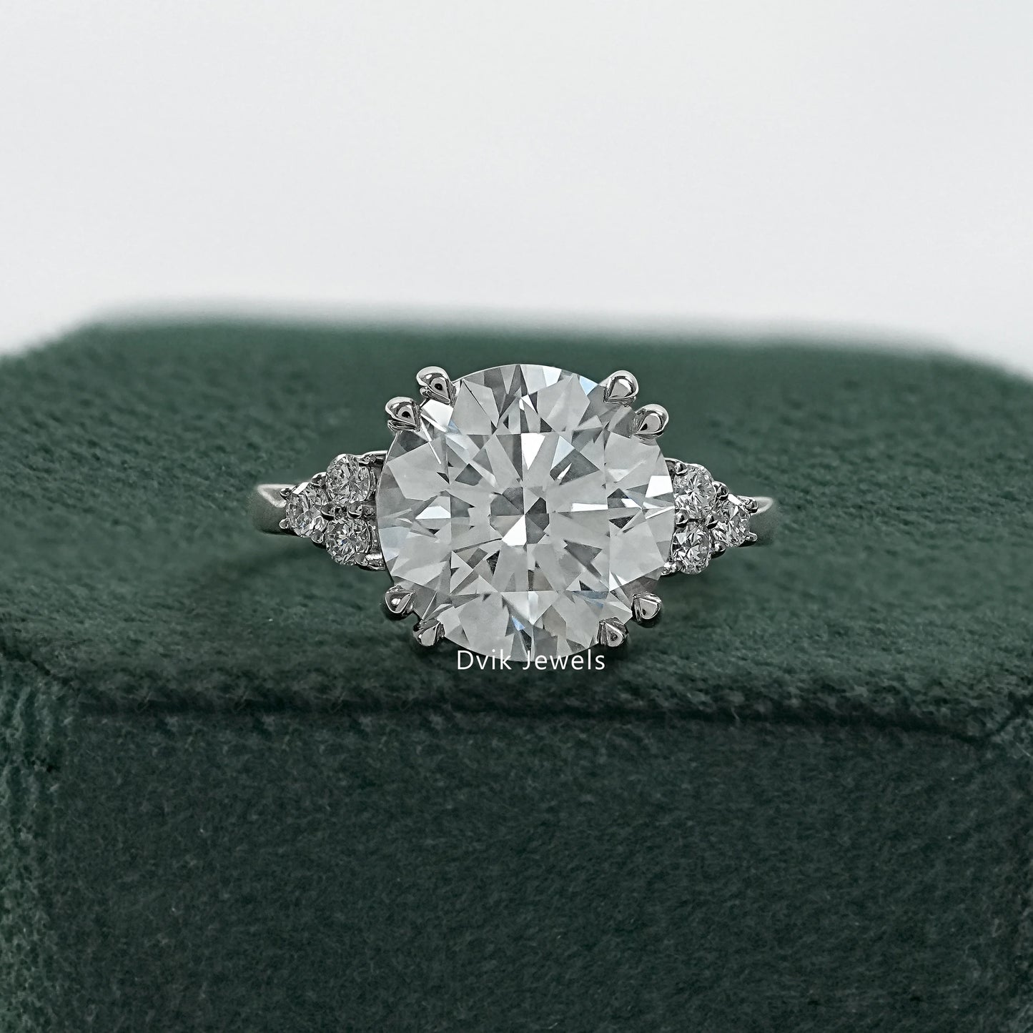 Round diamond cluster ring with double prong engagement ring front view