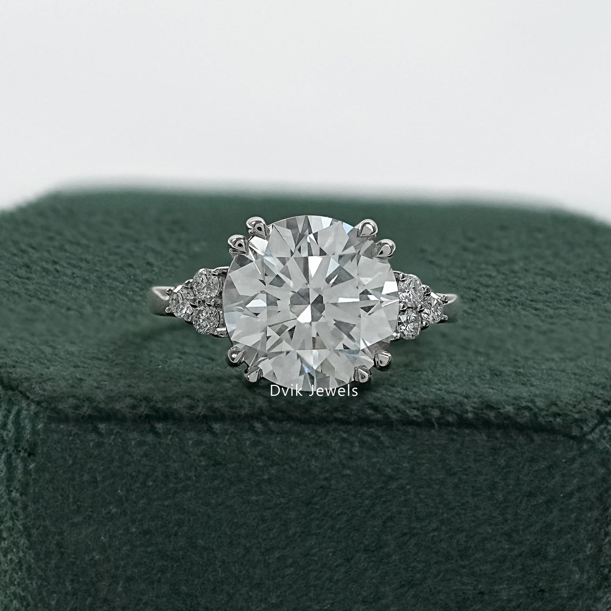 Round diamond cluster ring with double prong engagement ring front view