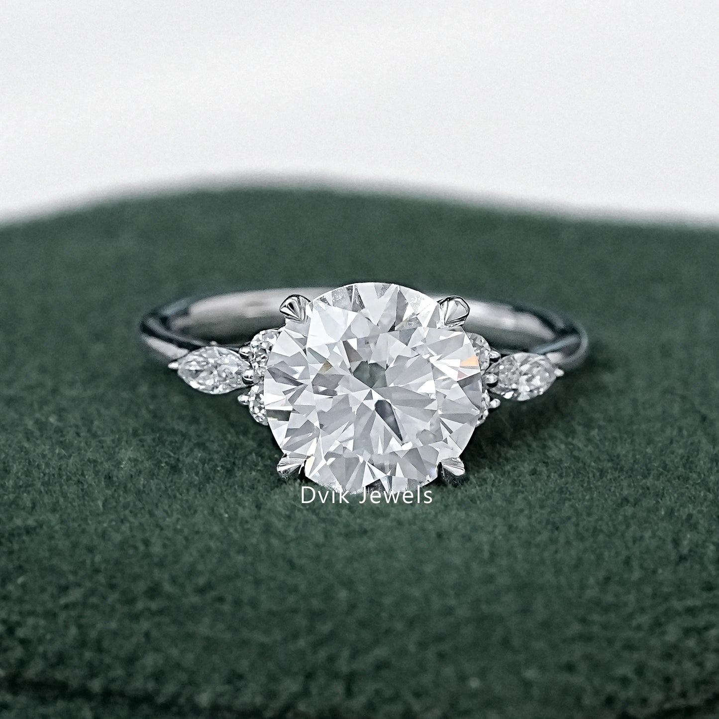 Classic Round Cut Center with Side Accent Engagement Ring