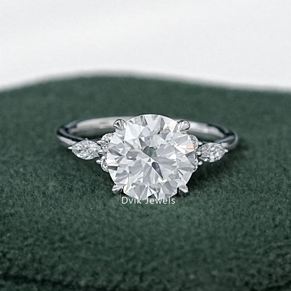 Classic Round Cut Center with Side Accent Engagement Ring