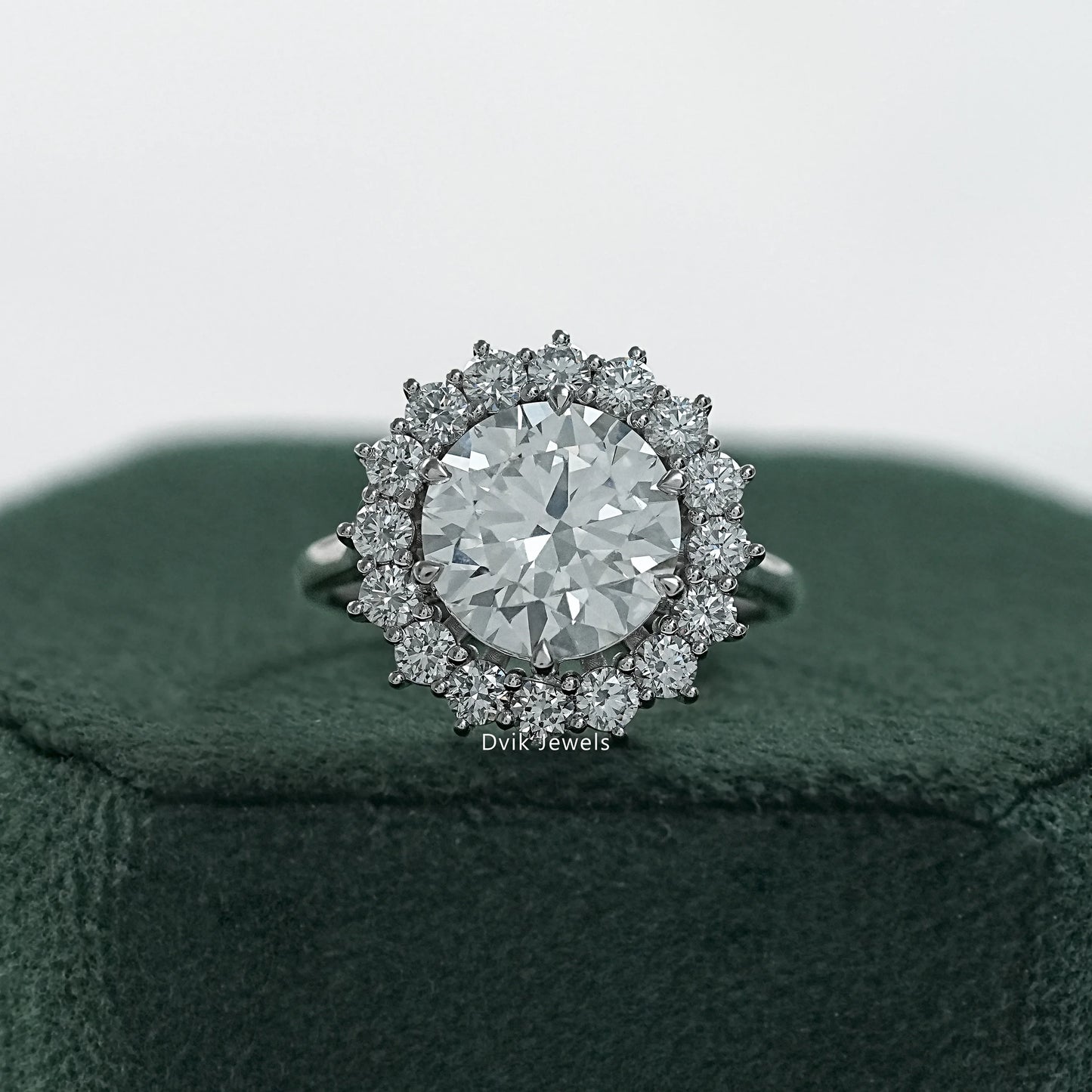 Round diamond halo engagement ring sunburst halo engagement ring front view