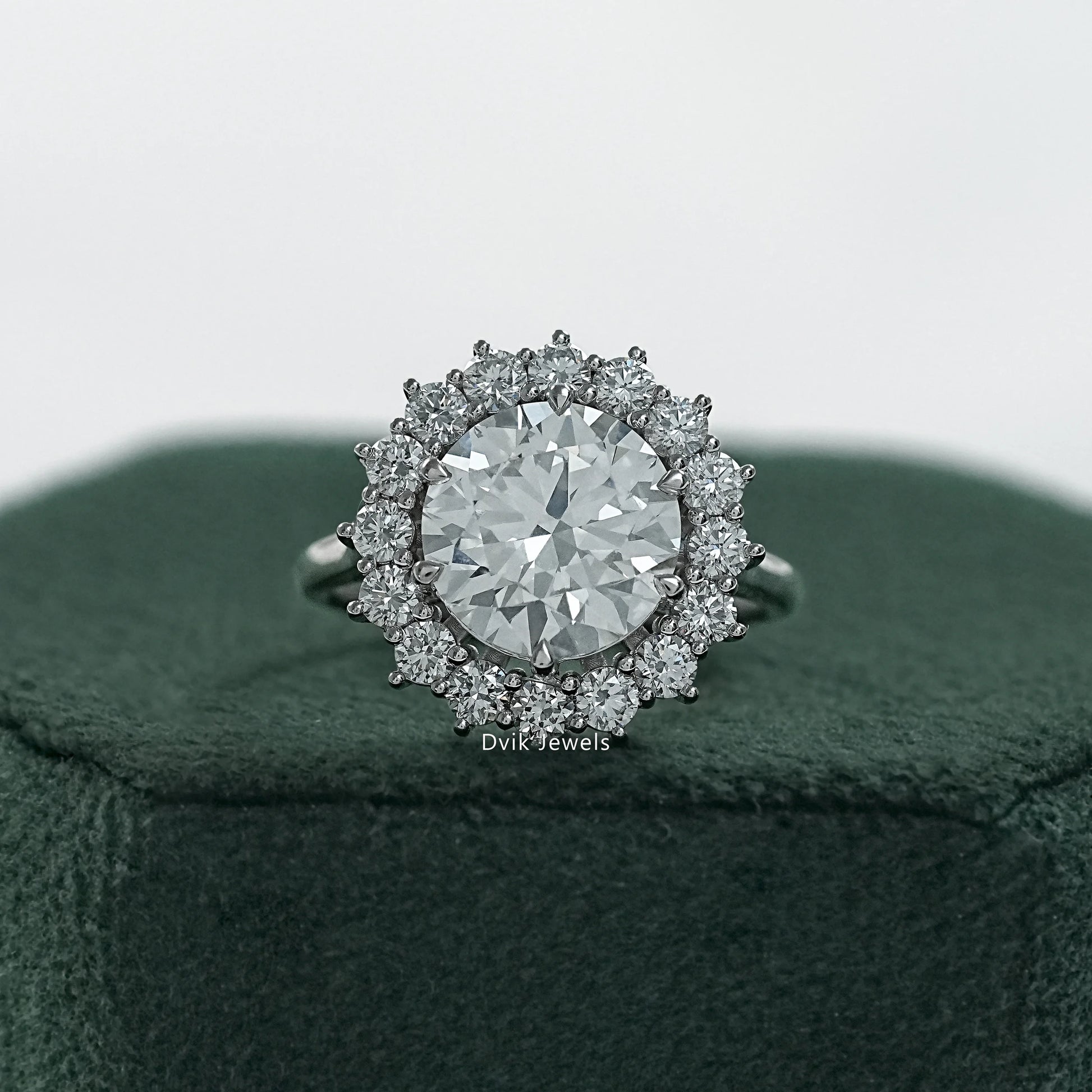 Round diamond halo engagement ring sunburst halo engagement ring front view