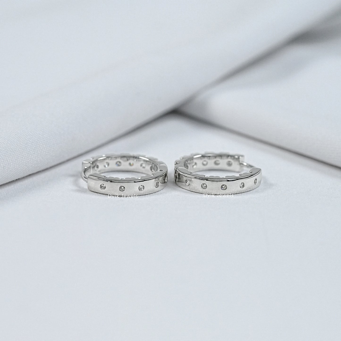 Back view of personalized hoop earrings showing the solid metal finish and smooth curved design.