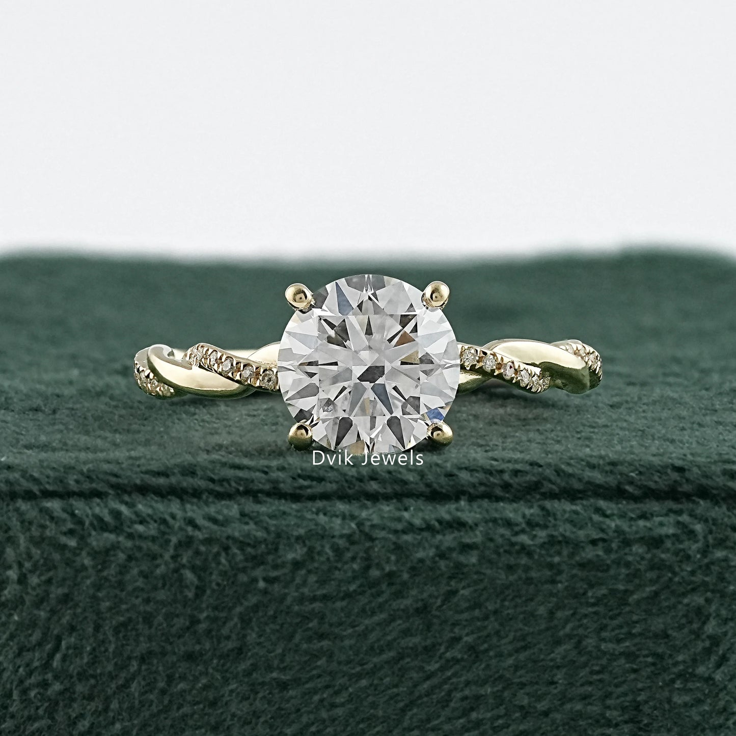 Round Cut Solitaire Engagement Ring with Twisted Diamond Band