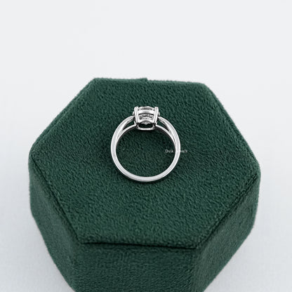Round Brilliant Cut Solitaire Ring with Lab Diamond placed on box showing back structure