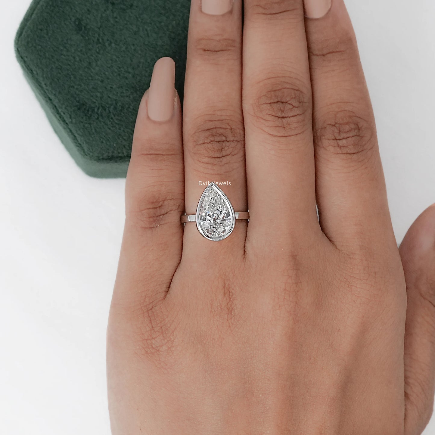Bezel Set Pear Cut Diamond Ring