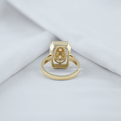Back view of halo diamond engagement ring showing basket setting and yellow gold band