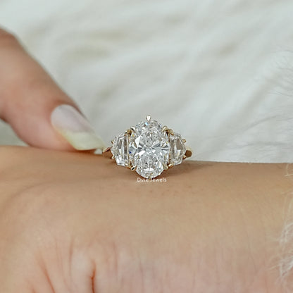 Three Stone Oval And Cadillac Lab Diamond Ring