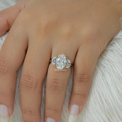 Three Stone Oval And Cadillac Lab Diamond Ring