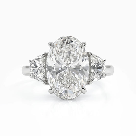 Three Stone Oval And Half Moon Cut Diamond Engagement Ring