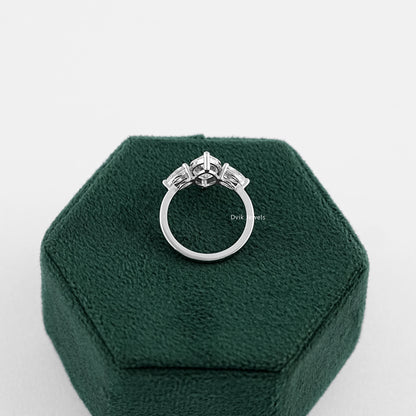 Three Stone Marquise Cut Engagement Ring held on jewelry box showing back setting