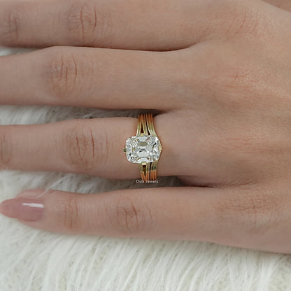 Cushion Cut Lab Diamond Old Mine style Solitaire Ring displayed on woman’s hand