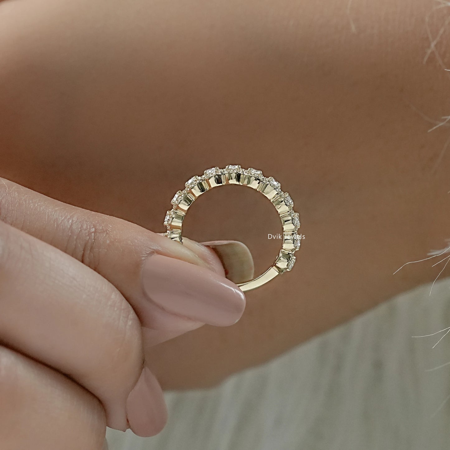 Lab grown diamond wedding bands shown in a side profile view