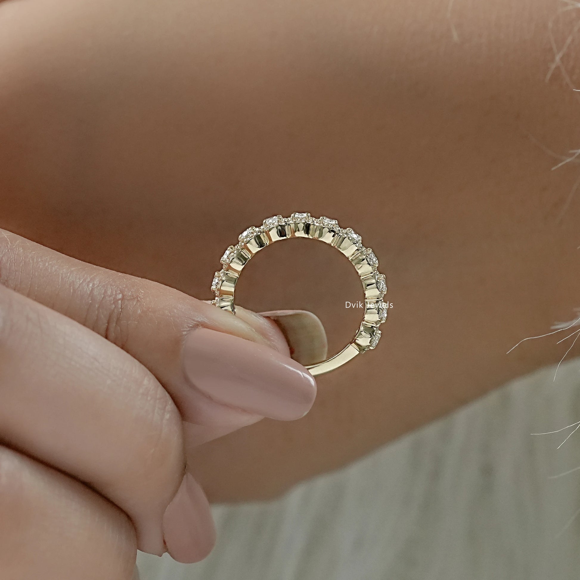 Lab grown diamond wedding bands shown in a side profile view