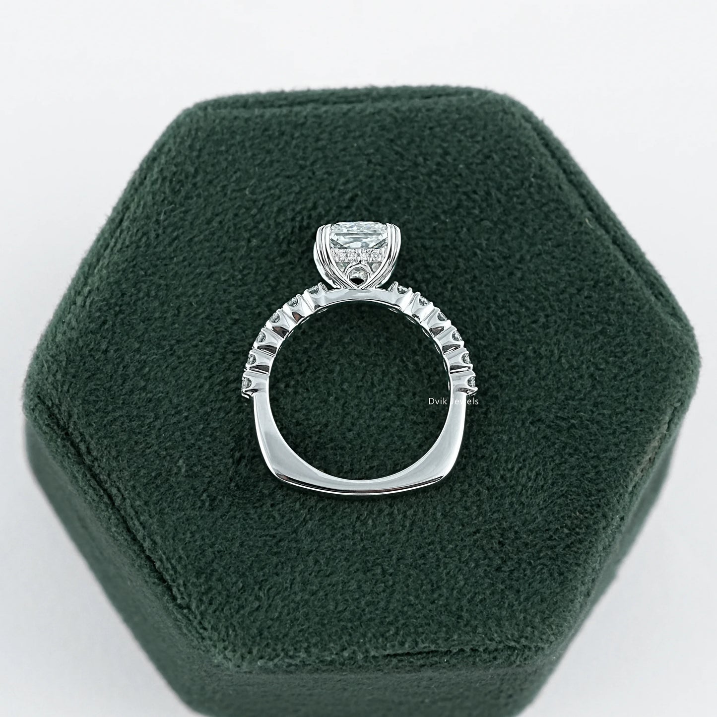 Princess Cut Accent Ring with EF-VS clarity Lab Diamond held on jewelry box showing mid-band brilliance