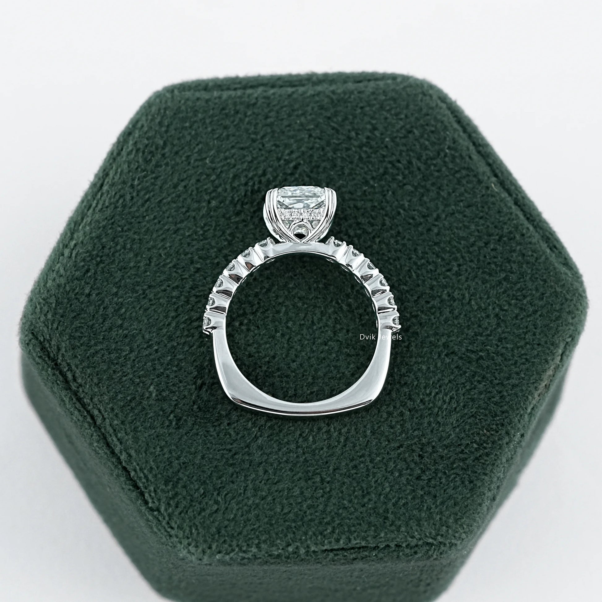 Princess Cut Accent Ring with EF-VS clarity Lab Diamond held on jewelry box showing mid-band brilliance