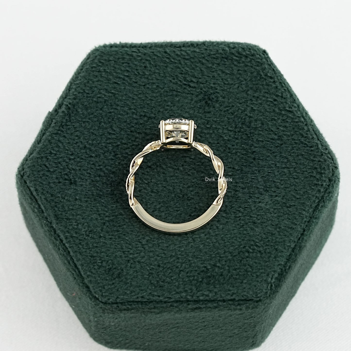 Round Cut Solitaire Engagement Ring with Twisted Diamond Band