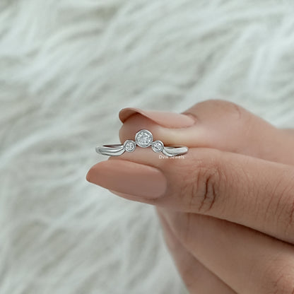 Lab diamond 3 stone ring with a sleek and polished yellow gold band.